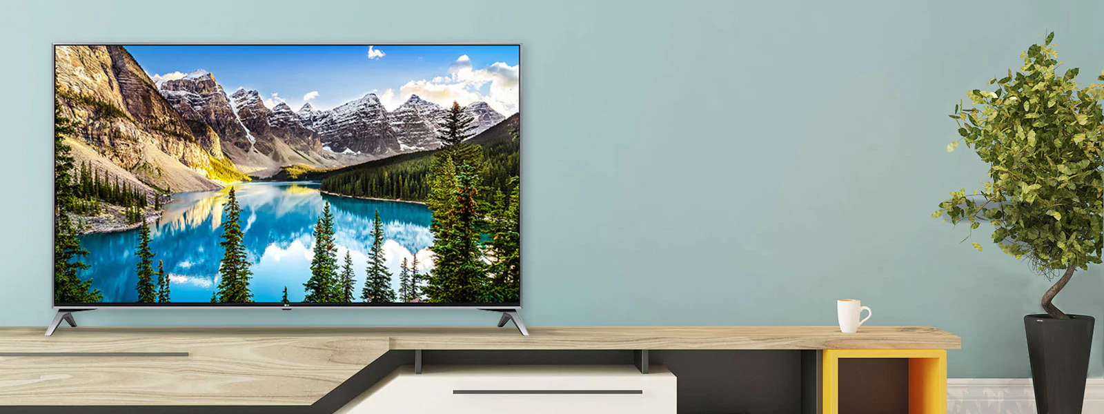 A person using LG TV AR app on a phone and a QR code which links to LG TV AR (http://www.lgtvism.com/lgtvar)